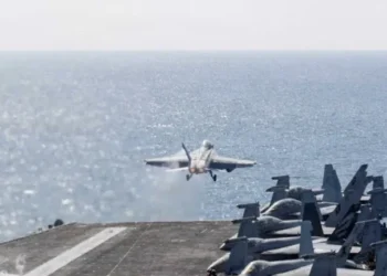 Sailors reportedly hurl themselves overboard the USS Abraham Lincoln