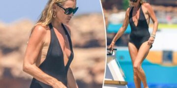 Kate Moss turns up the heat in black swimsuit while vacationing with daughter Lila in Spain