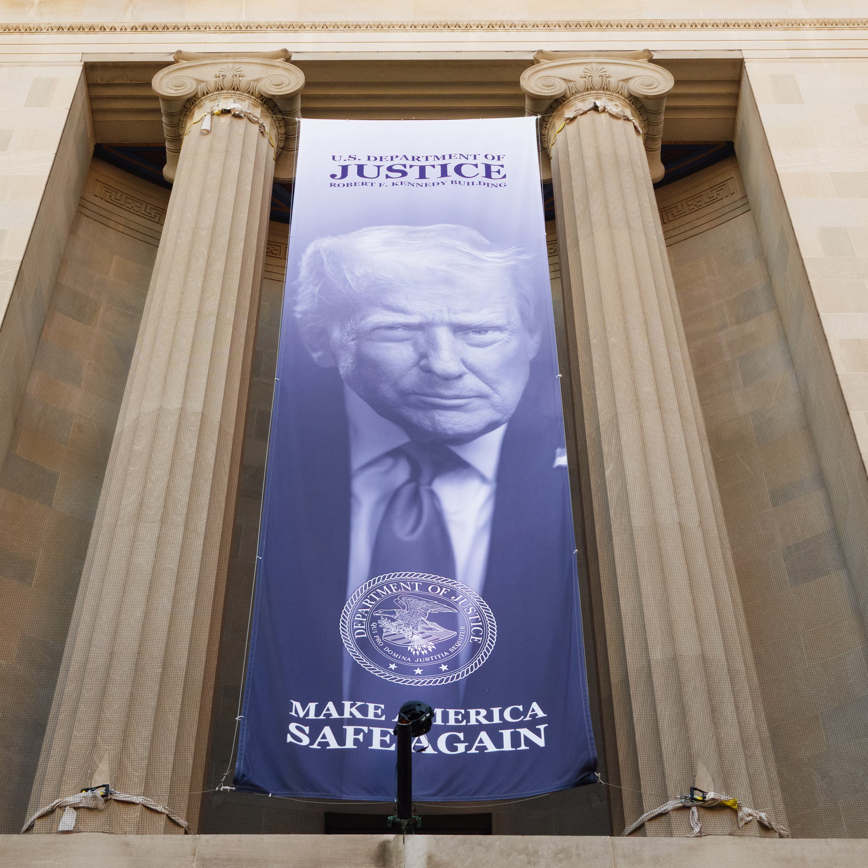 a banner of Donald Trump