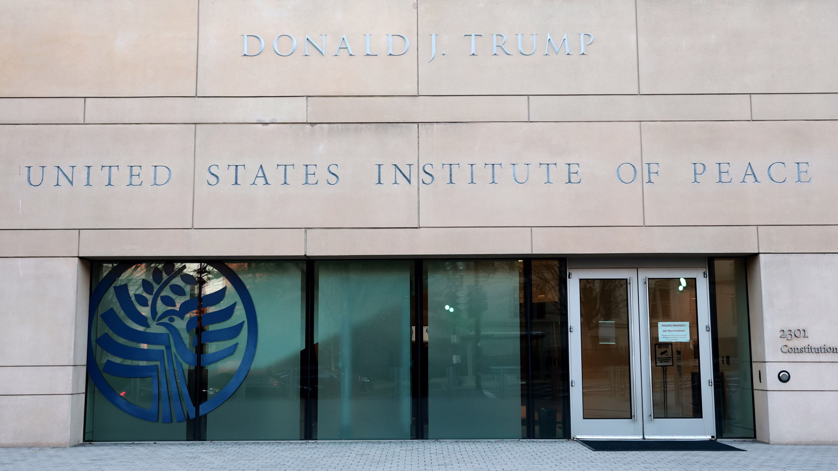 United States Institute of Peace with Donald Trump's name on exterior of building