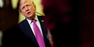 Trump’s pardon czar warns of ‘scammers’ — and points at an RFK Jr. ally
