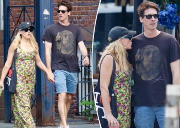 Busy Philipps holds hands with comedian Jason Selvig after revealing malignant brain tumor