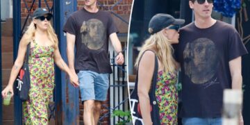 Busy Philipps holds hands with comedian Jason Selvig after revealing malignant brain tumor
