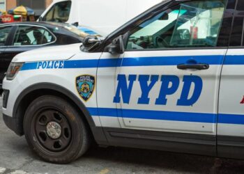 BMW driver smashes, flips NYPD cruiser — and injures 2 cops, video shows