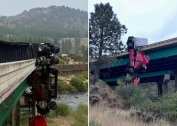 Big rig left dangling from California bridge as driver ejected from truck