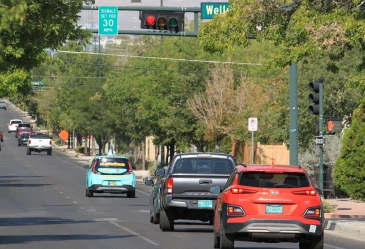 With ‘virtual speed bumps,’ these cities have reduced crashes by rewarding slower drivers with fewer red lights
