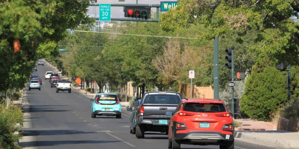 With ‘virtual speed bumps,’ these cities have reduced crashes by rewarding slower drivers with fewer red lights