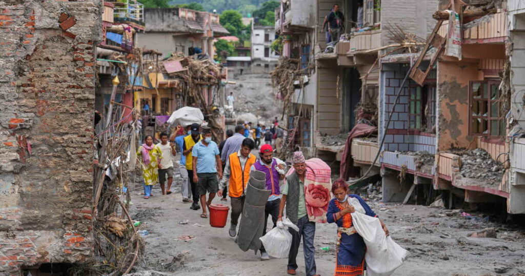 Nepal-China flood survivors reach safe areas as families await news of nearly 3,000 missing