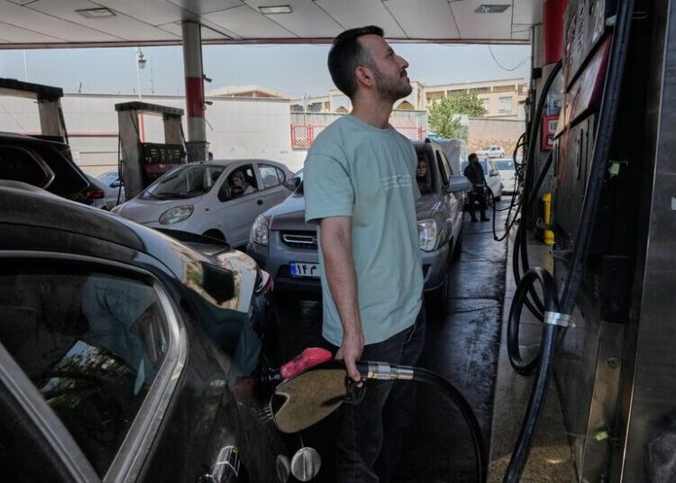 Long Lines for Gas in Iran Show War and U.S. Blockade Squeezing Supply
