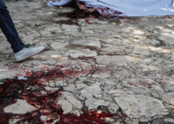 Hundreds attend funeral in Haiti for 4 victims of brutal gang attack that killed 47