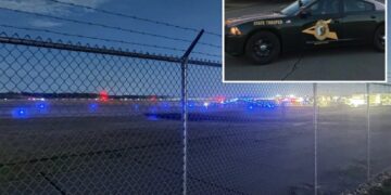 Airport chaos erupts after driver suddenly smashes through fence, hits plane and tractor: police