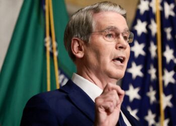 Iran’s economy, long accustomed to sanctions, feels new U.S. pressure