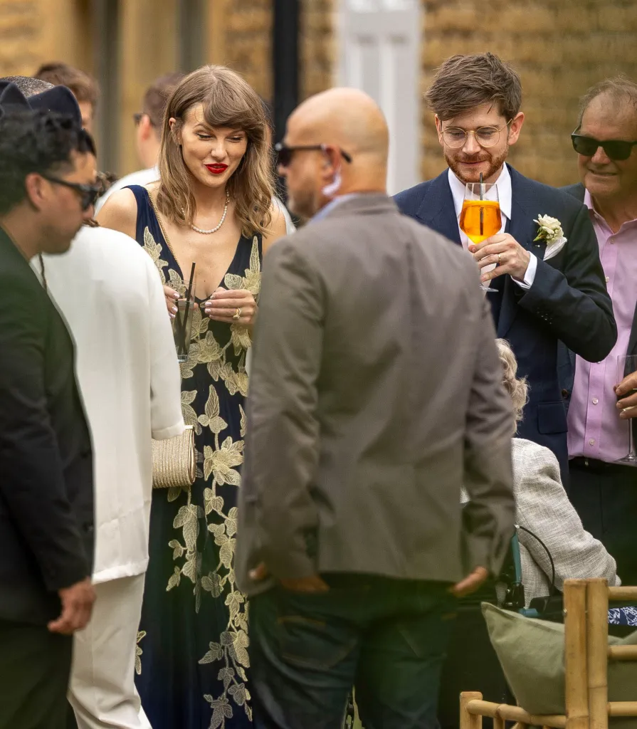 Taylor Swift at the wedding of recording engineers Oli Jacobs and Laura Sisk.