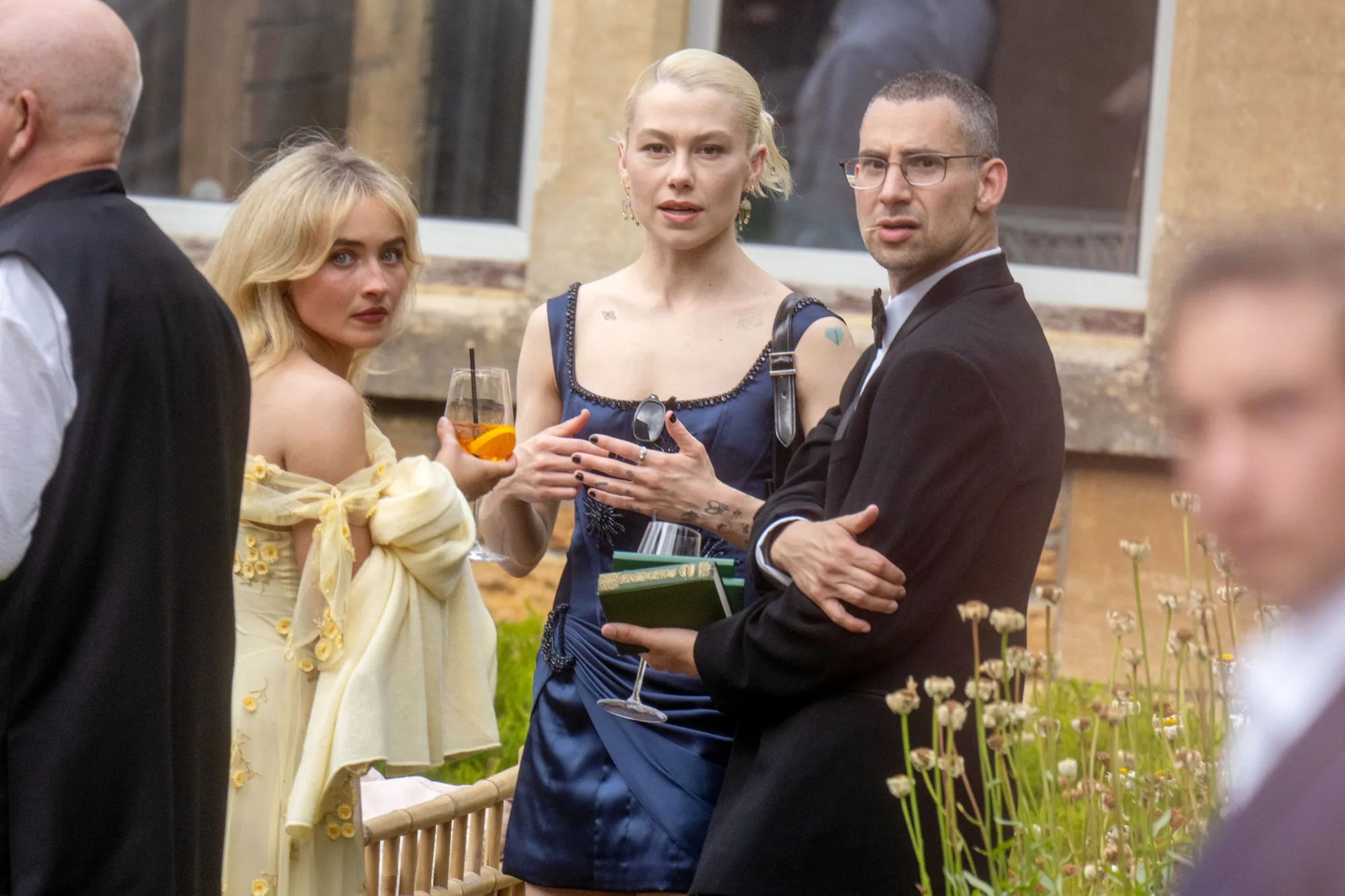 Sabrina Carpenter, Phoebe Bridgers, and Jack Antonoff attend a wedding.