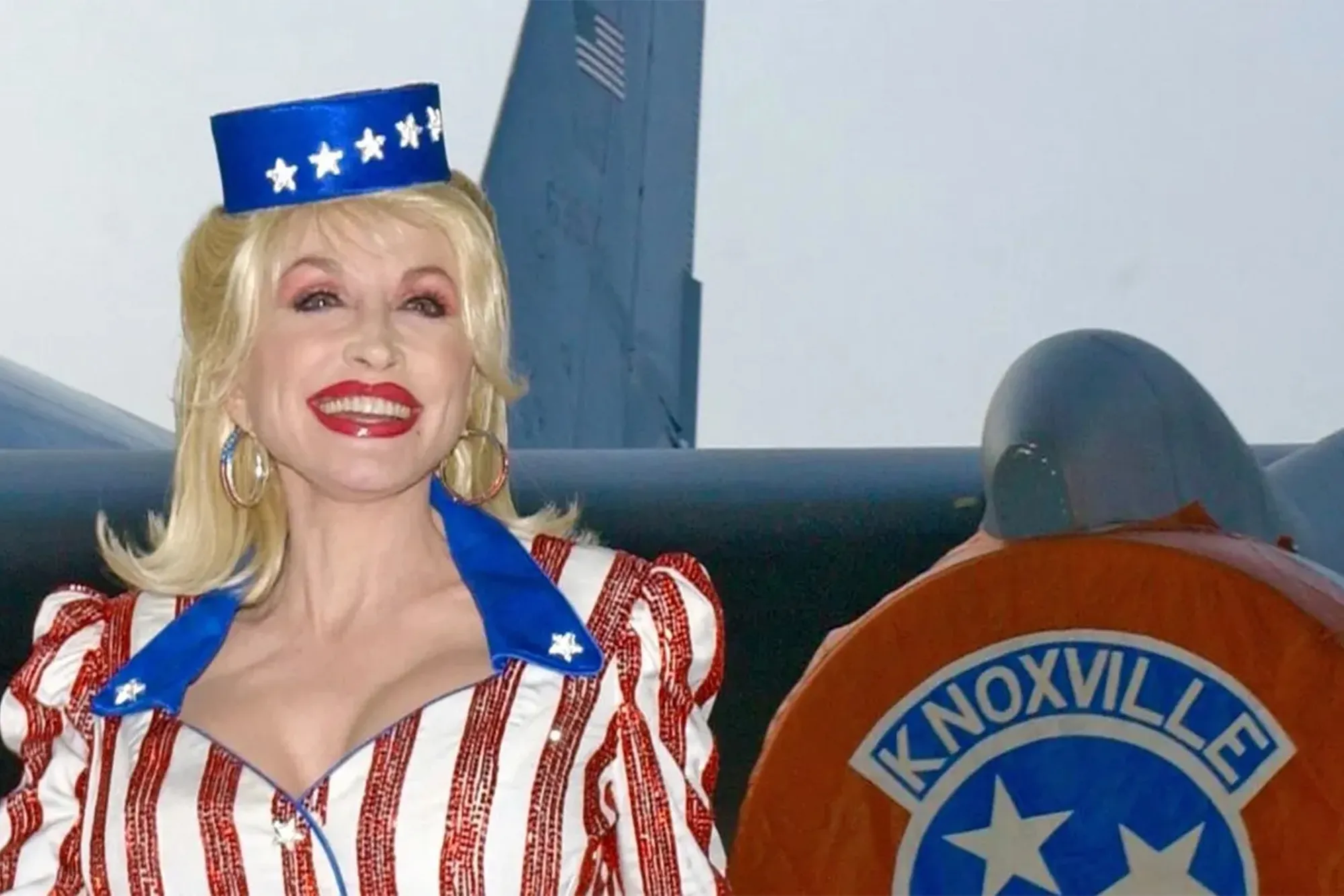 Dolly Parton smiles as she arrives for a special event held Sept. 8, 2004, at McGhee Tyson Air National Guard Base, Tenn.