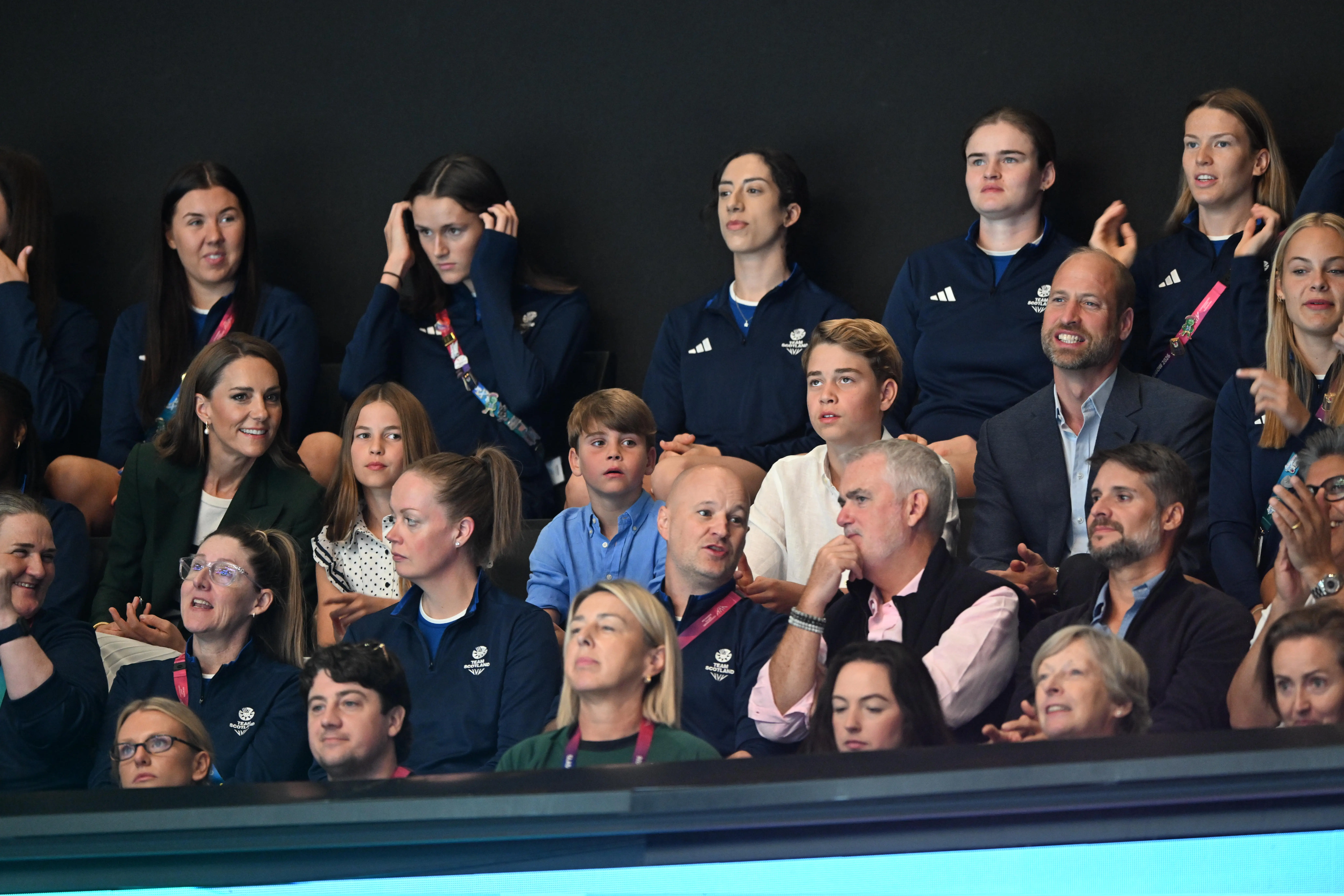 The British Royal family, including William, Prince of Wales, Catherine, Princess of Wales, Princess Charlotte, Prince Louis, and Prince George, watching the Commonwealth Games.