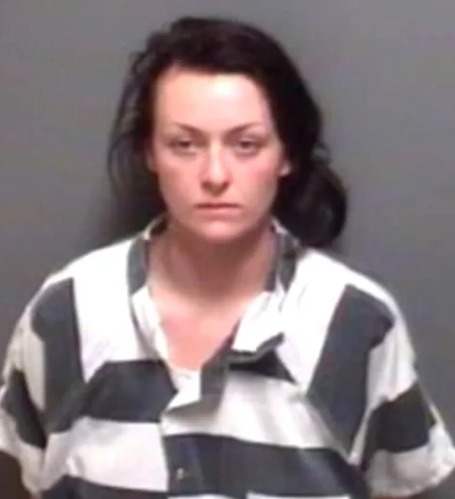 Mugshot of Grace Pauline Kelley in a striped prison uniform.