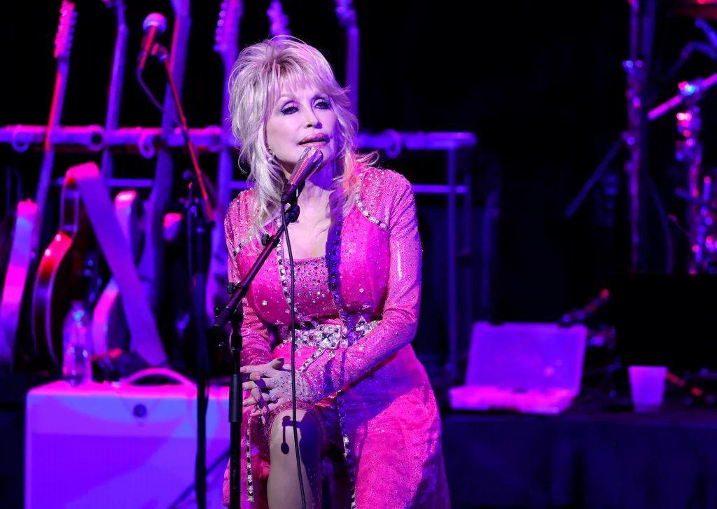 Dolly Parton performing at the Kiss Breast Cancer Goodbye Concert.