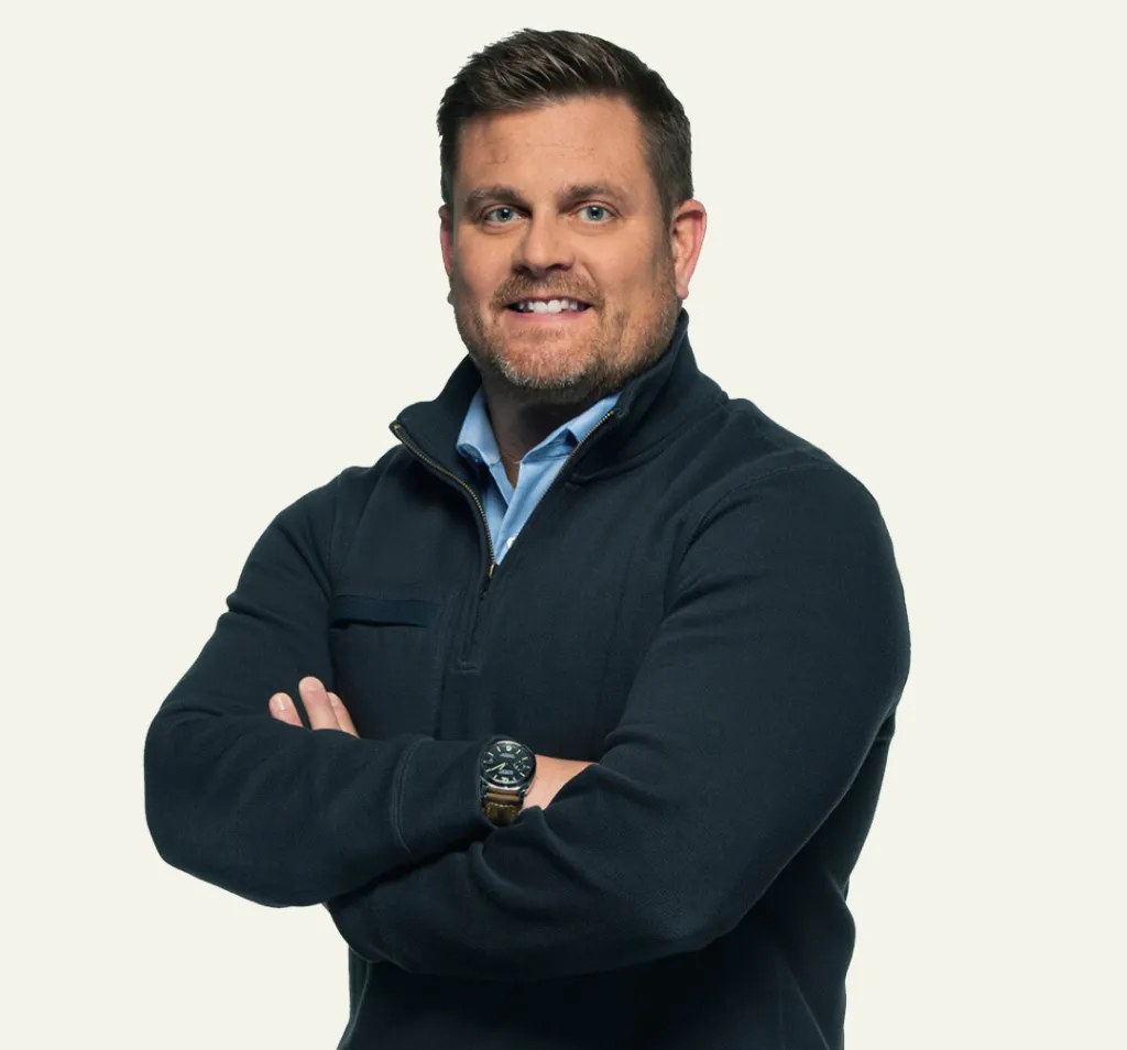 Headshot of Brian Thompson.