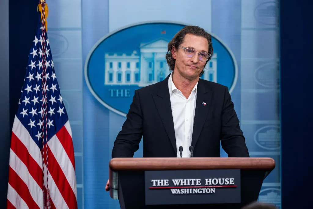 Matthew McConaughey addressing the White House Press Briefing Room podium.