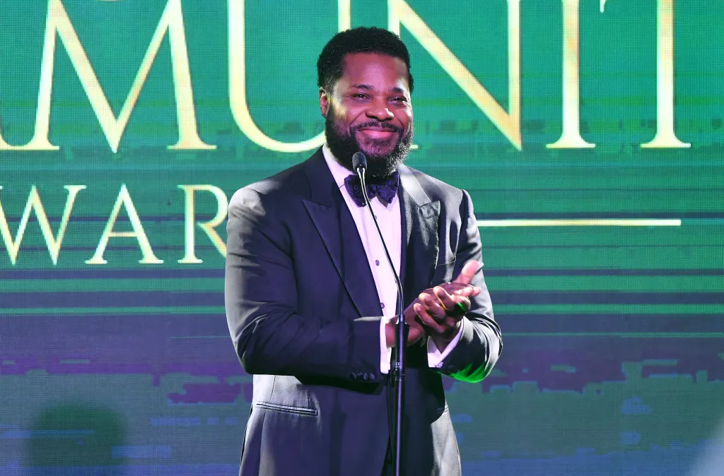 Malcolm-Jamal Warner speaking onstage during the 2023 Beloved Community Awards.