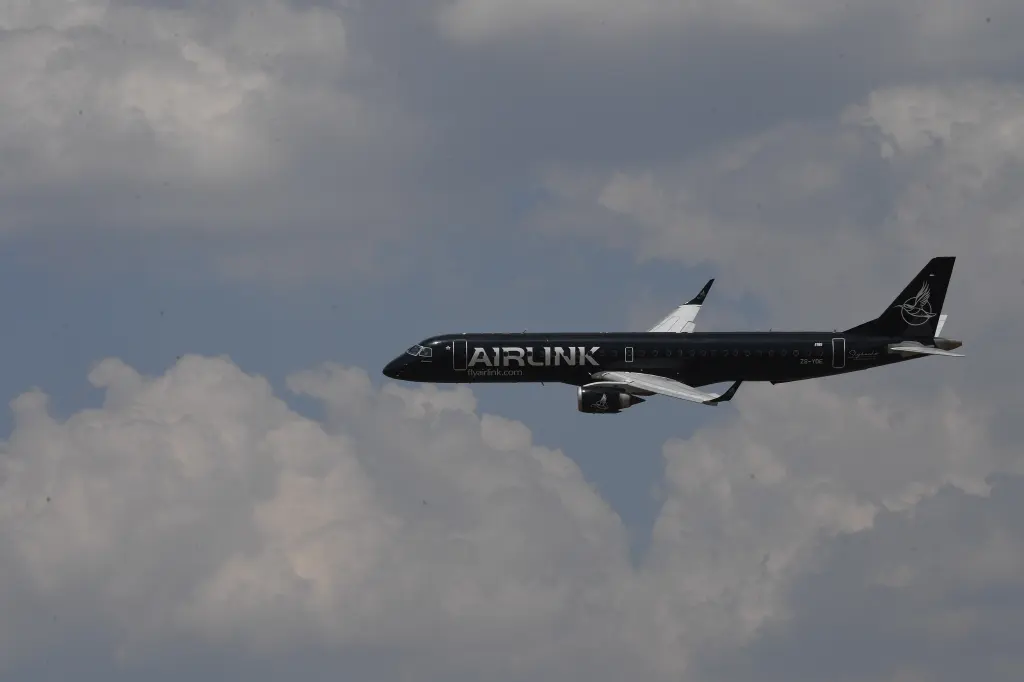 Airlink aircraft in flight at the Wonderboom National Airport Airshow.
