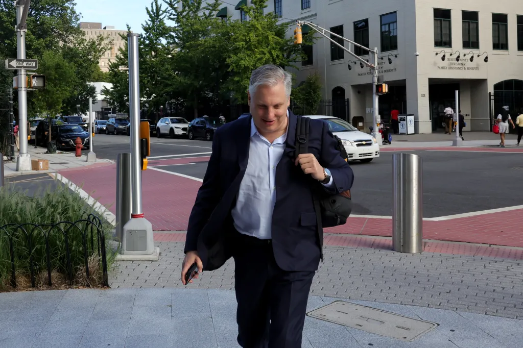 Billionaire John Overdeck arrives at Newark Family Court.