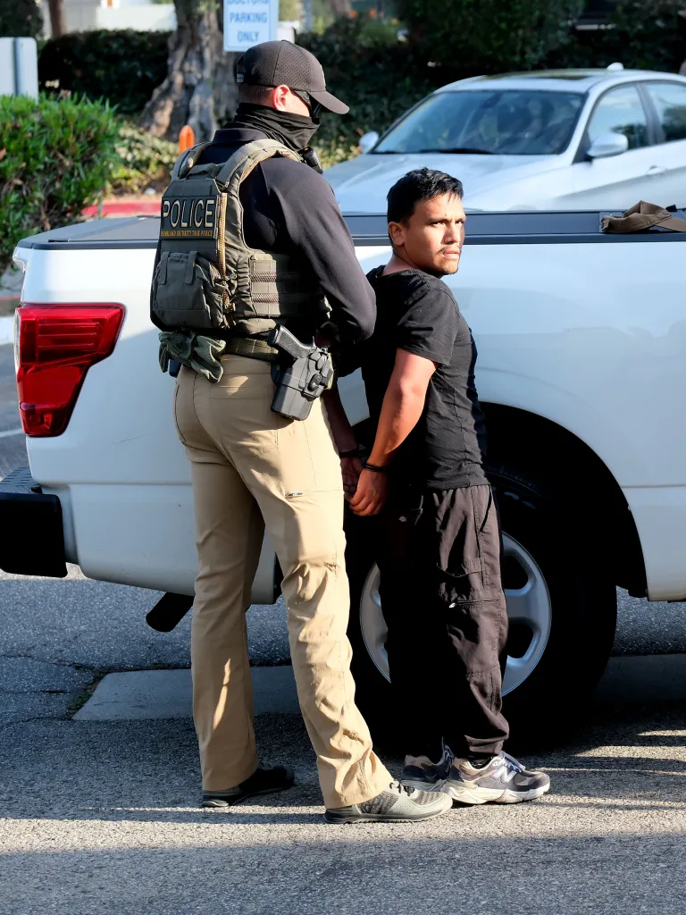 HSI agents arrest Darwin Rivera-Flores in Winnetka, California, in relation to voter fraud.