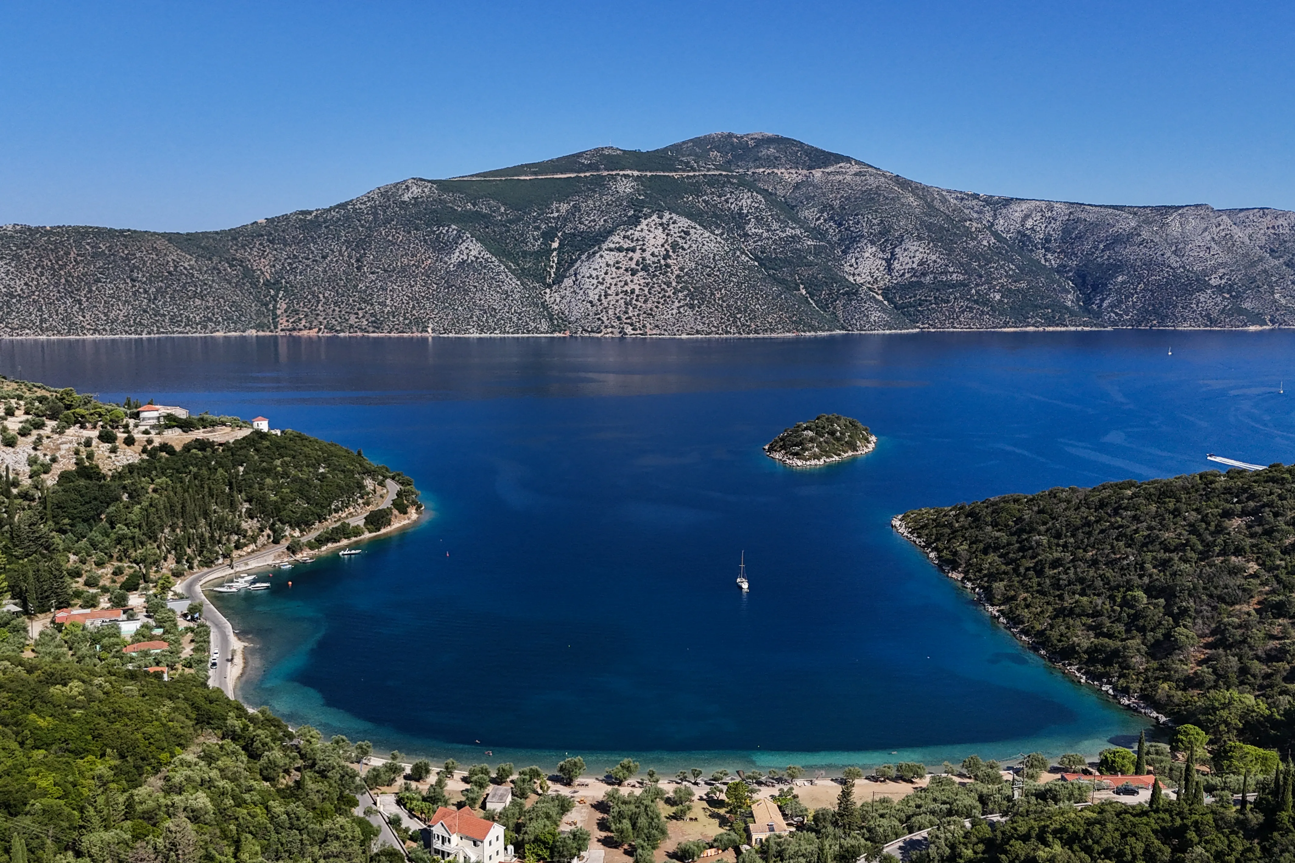 An aerial view shows the shows Dexa beach, where legend has Odysseus landing when he finally returned home, on the island of Ithaca, on August 3, 2026.