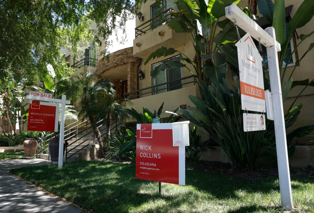 For sale signs for condominiums in Los Angeles, California.
