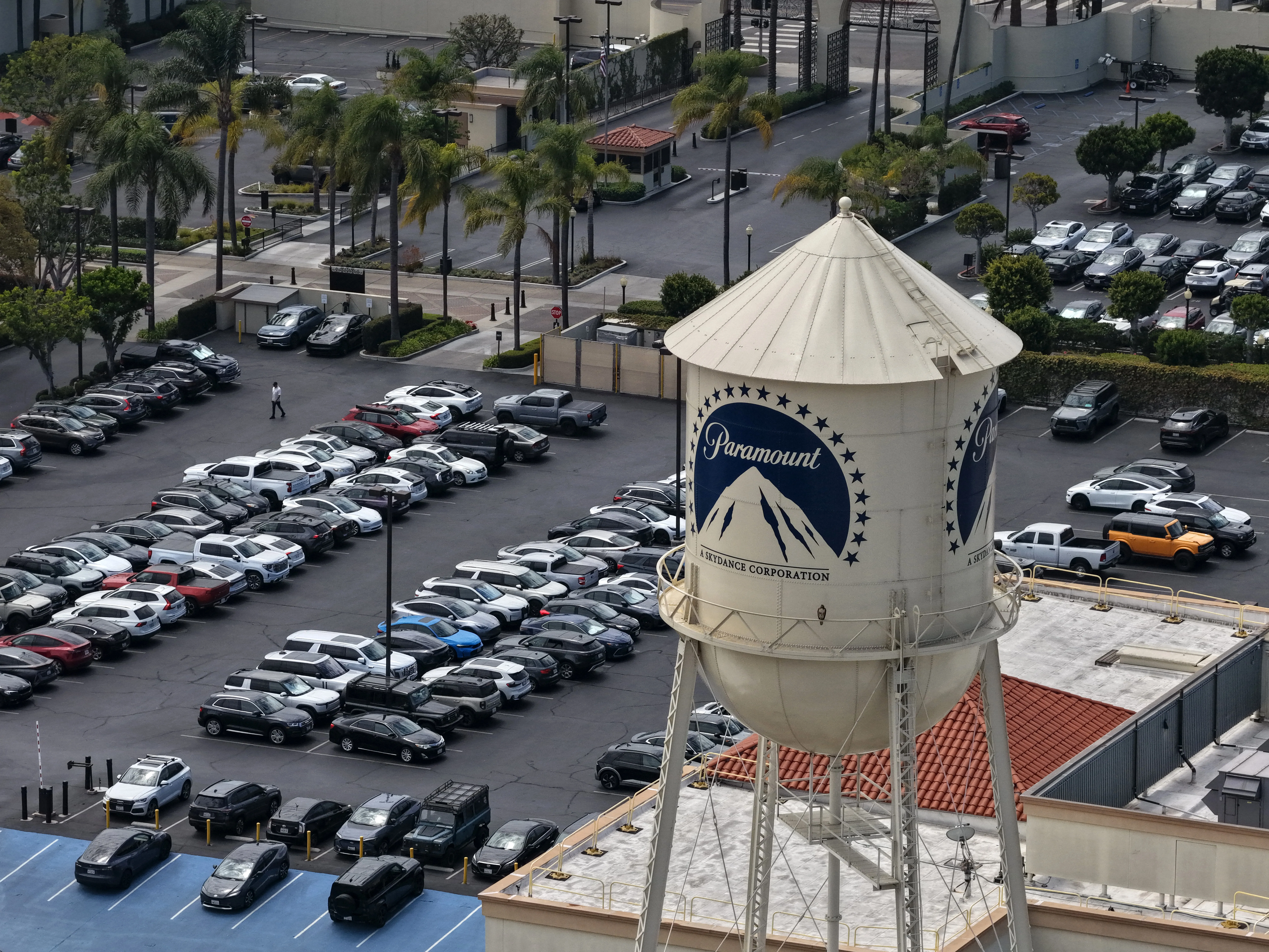 An aerial view of the Paramount logo on a water tower at the Paramount Studios lot.
