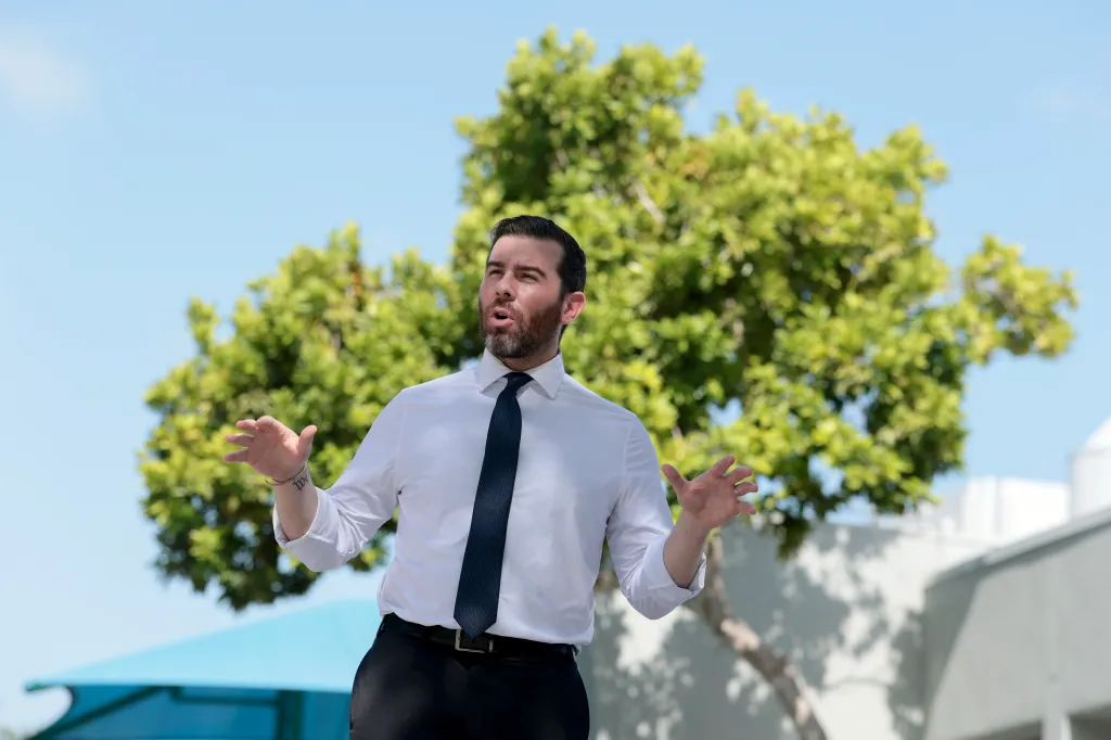 Florida Democratic congressional candidate Oliver Larkin speaks to supporters.