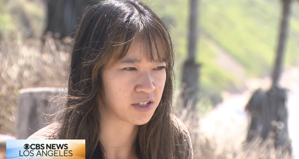 Amanda Trinh, Teresa Tran's daughter, speaks to a reporter.