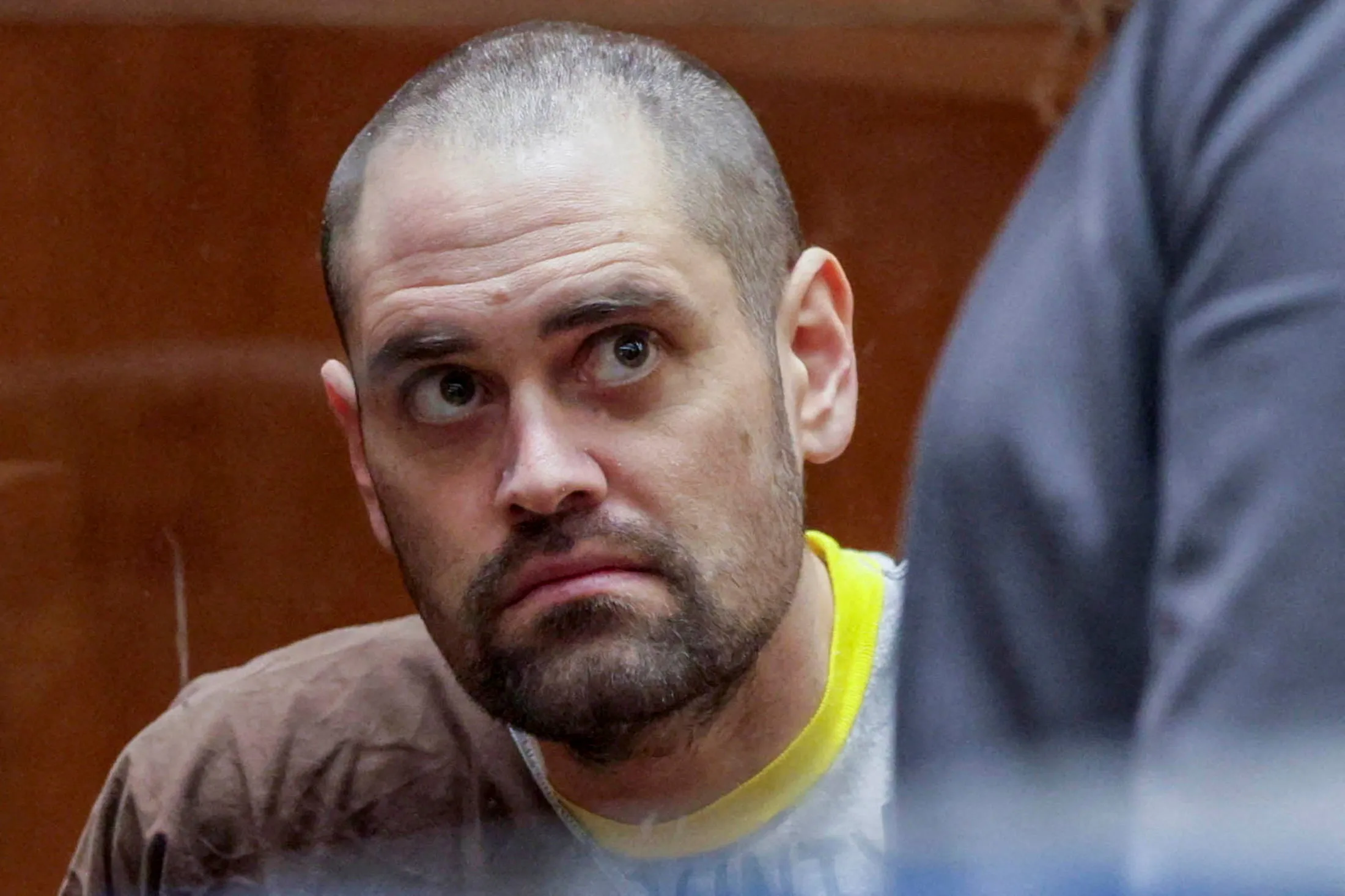 Nick Reiner looks up in court during his arraignment for the killing of his parents.