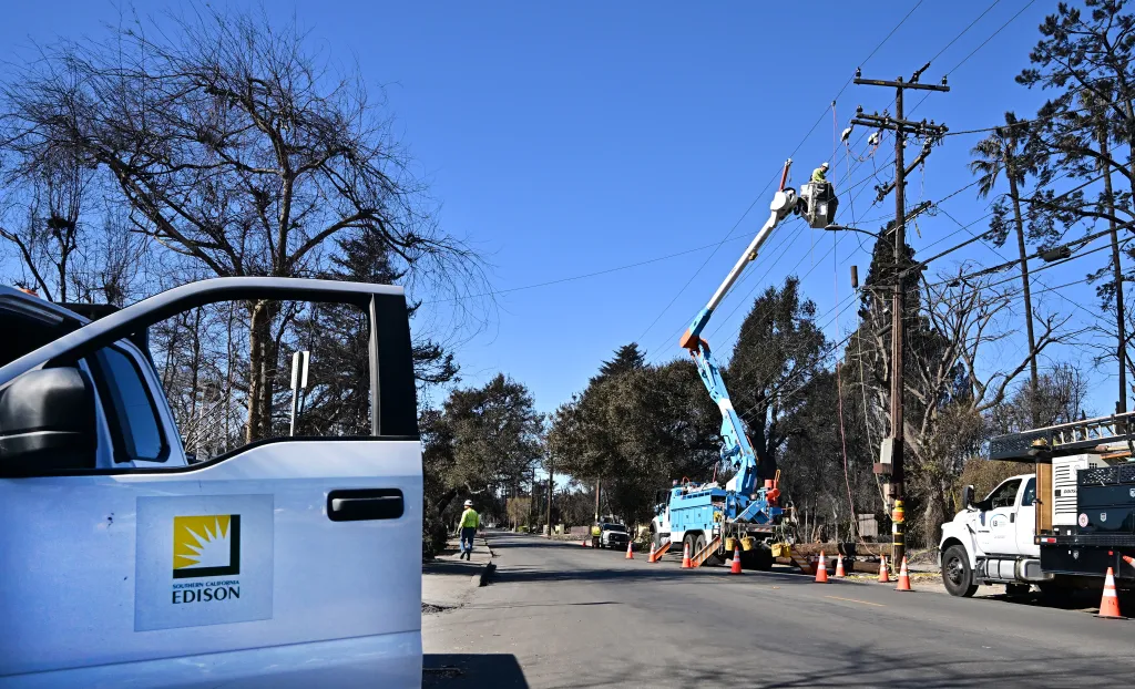 Southern California Edison workers repairing and restoring power lines in Altadena.