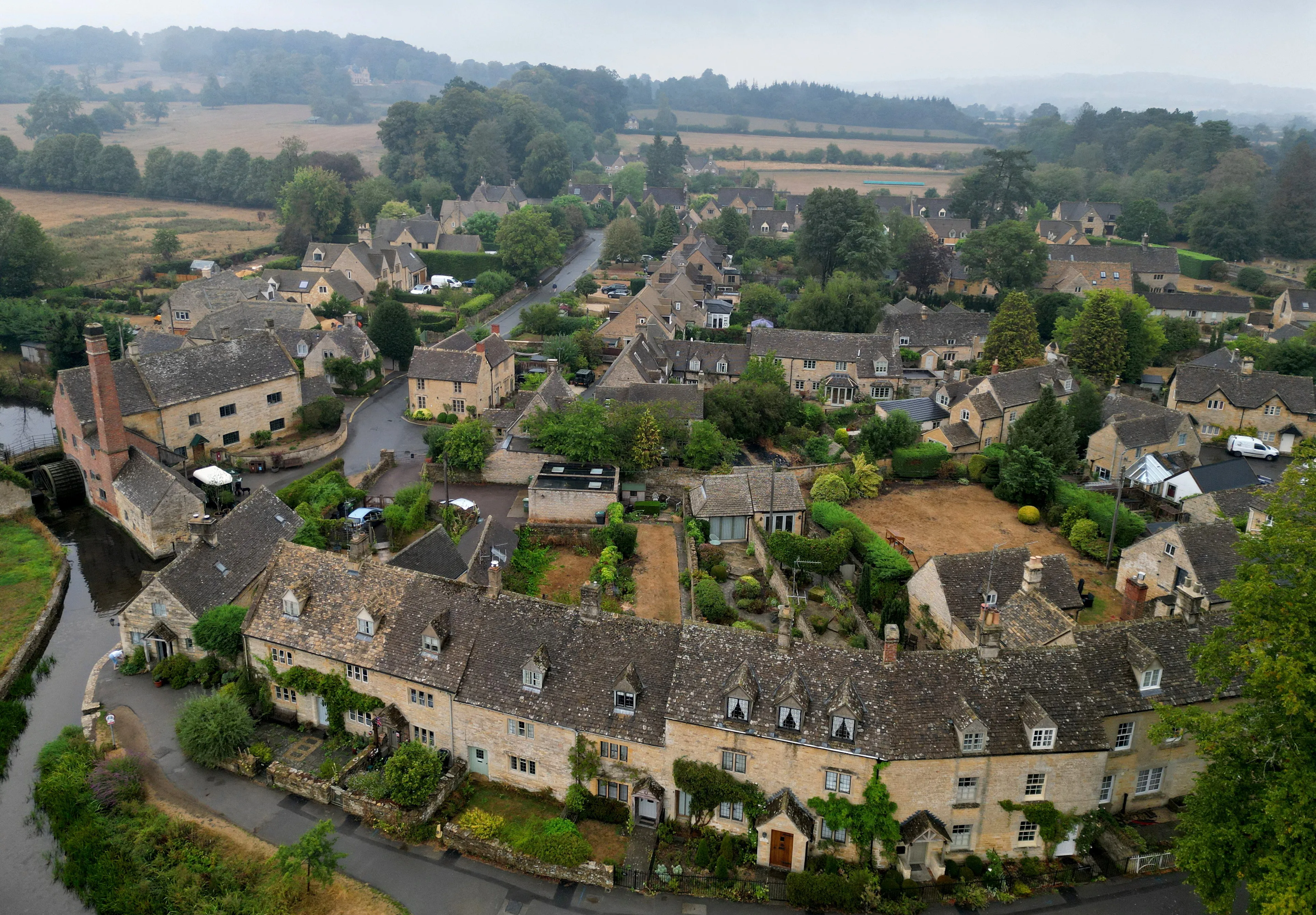 Drone view of Lower Slaughter village in the Cotswolds region of Britain.