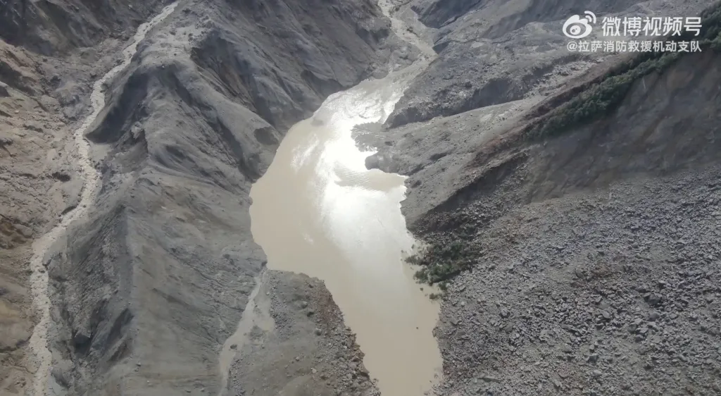 A drone view shows a barrier lake formed following a mudslide in the border area between the Tibet Autonomous Region, China and Bagmati province, Nepal, on Friday.
