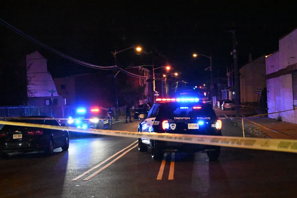 Trenton Police officers block the street where multiple people were shot in the New Jersey capital.