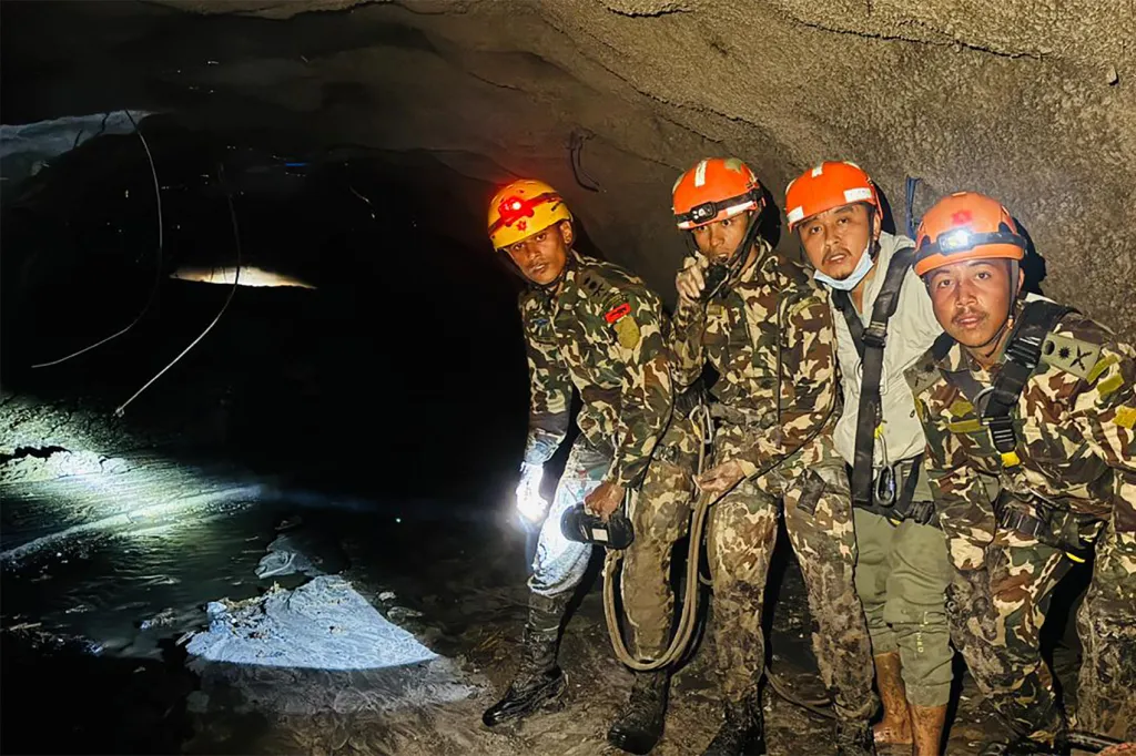 Nepali soldiers inspect inside a tunnel to rescue workers after flash floods at Rasuwagadhi Hydropower Project in Rasuwa district, Nepal, on Aug. 31, 2026.