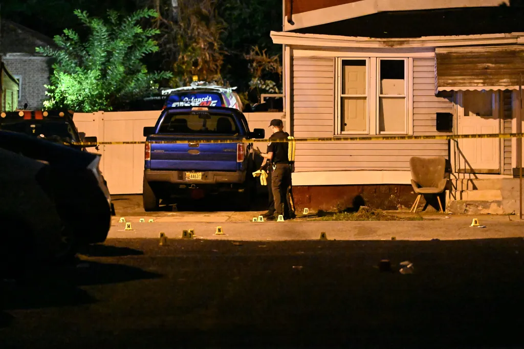 Trenton Police officers work the scene where multiple people were shot in the area of Locust Street in Trenton, New Jersey, on August 30, 2026.