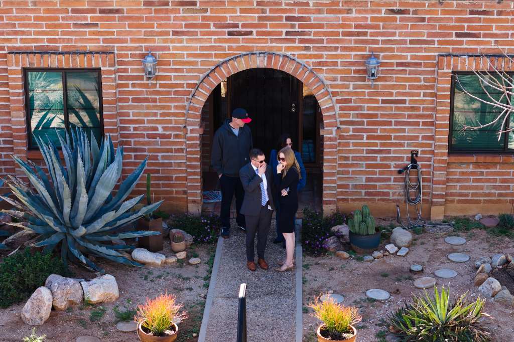 Investigators looking around the residence of Nancy Guthrie in Tucson, Arizona.