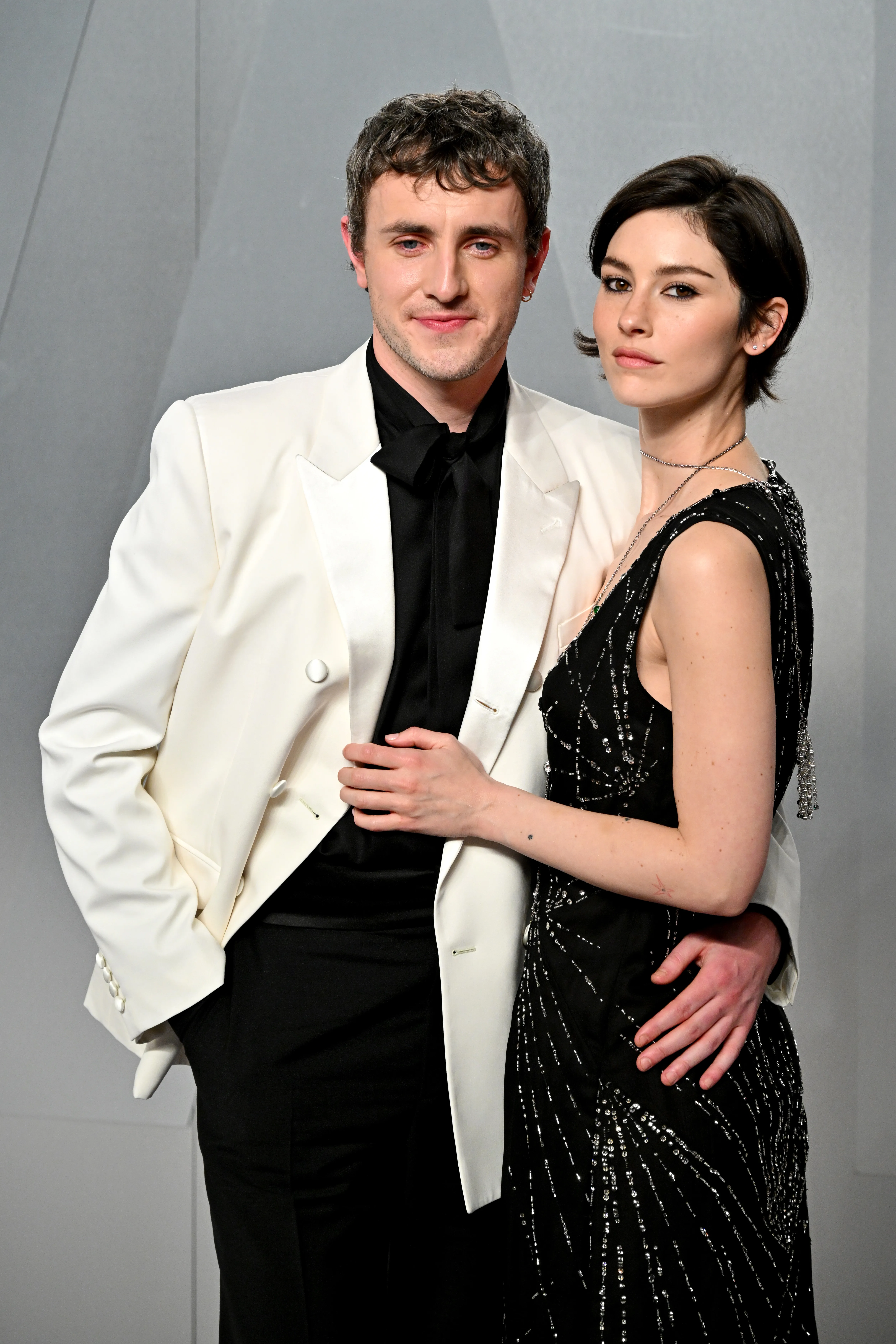 Paul Mescal and Gracie Abrams posing together at the 2026 Vanity Fair Oscar Party.