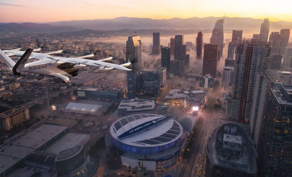 Illustration of an Archer Aviation Midnight aircraft flying over Los Angeles with the Crypto.com Arena below.