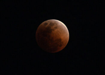 Catch the Moon Blushing Blood Red During a Deep Lunar Eclipse