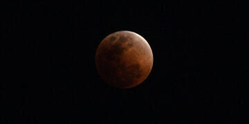 Catch the Moon Blushing Blood Red During a Deep Lunar Eclipse