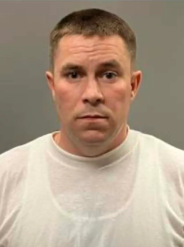 Mugshot of a 36-year-old man arrested for forcing his way into a home.