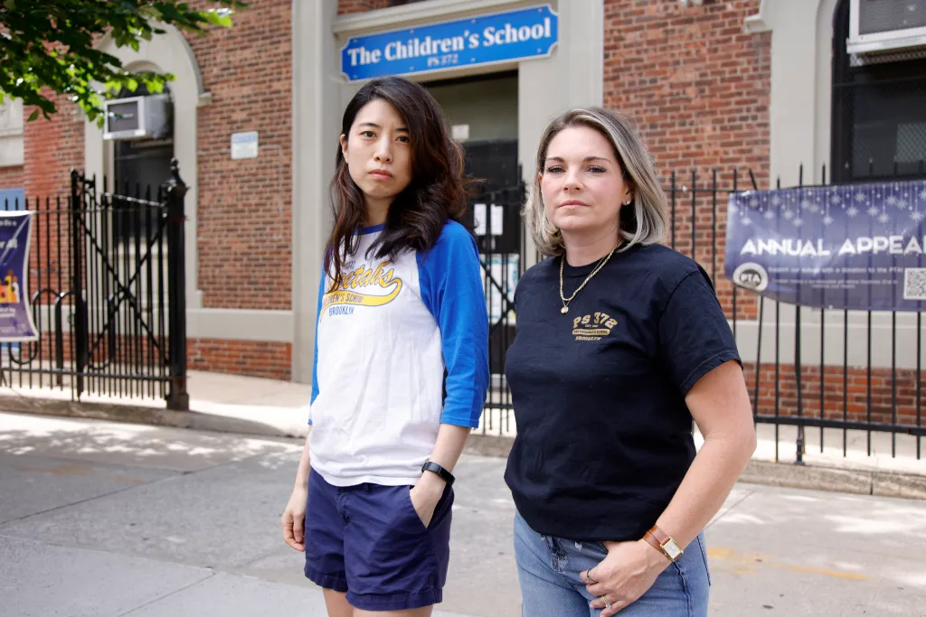 Michelle Tsai, left, and Julia Finegan outside P.S. 372 on Friday, August 21, 2026.