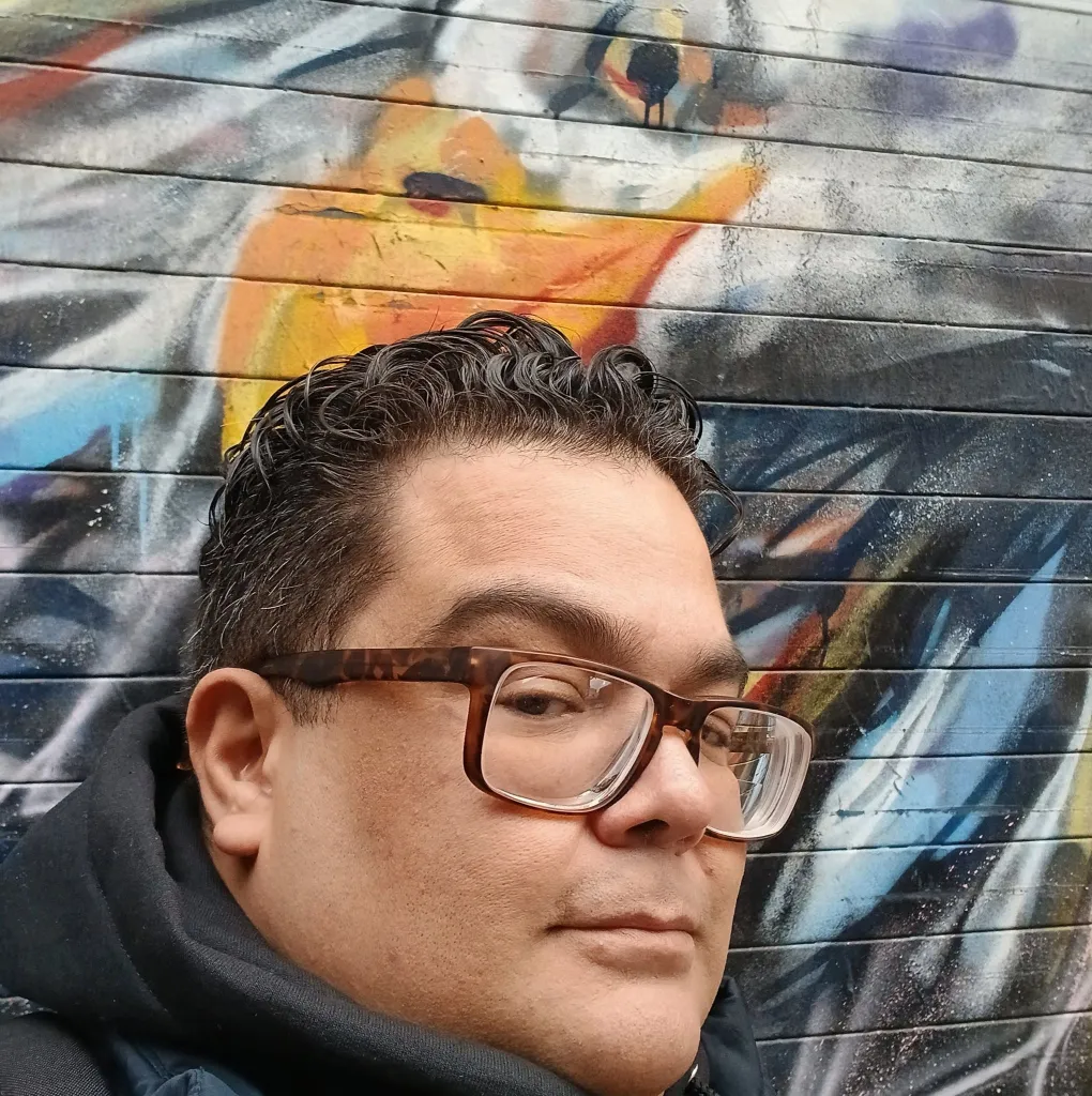 The Bronx man was charged with two counts of assault as a hate crime and one count of criminal mischief as a hate crime and will be arraigned Saturday.