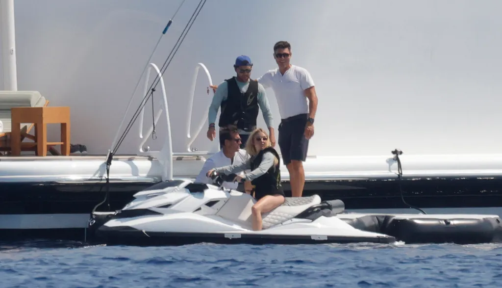 Sydney Sweeney on a jet ski with Scooter Braun and friends on a superyacht in Mallorca.