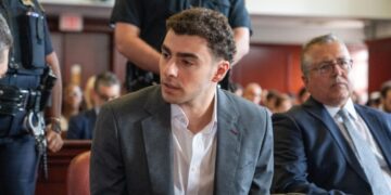 Mangione admits to shooting insurance CEO, pleads guilty to federal charges